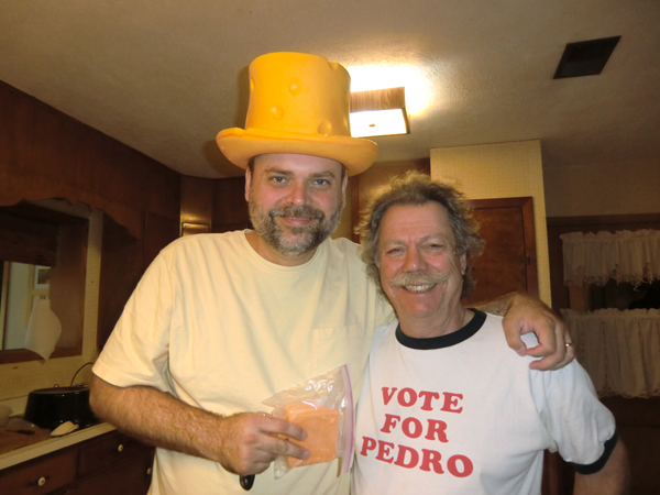 Stephen Seifert & Tom Garrett with 12 year old cheddar cheese and cheese hat
